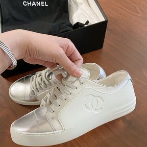 Chanel Sneakers (white & silver) size 38 (US 8)